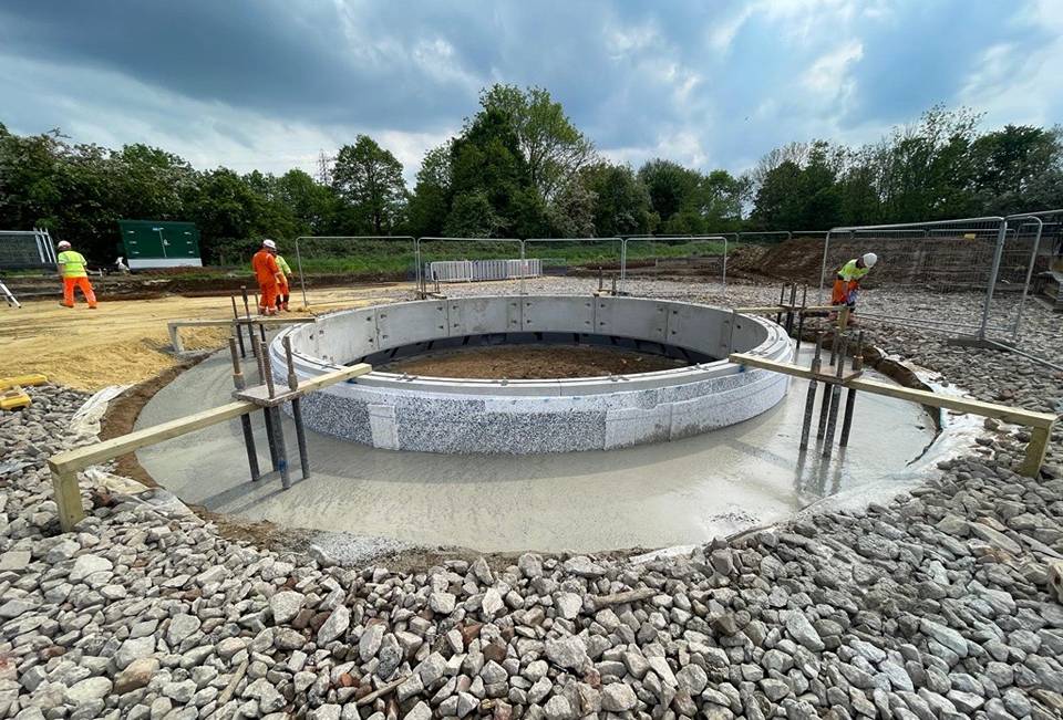 Concrete being poured around the top of a new storage tank at Dearne Hall Road